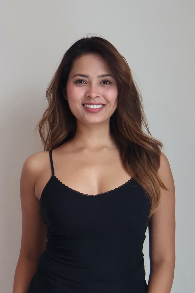 Alina Roy smiling