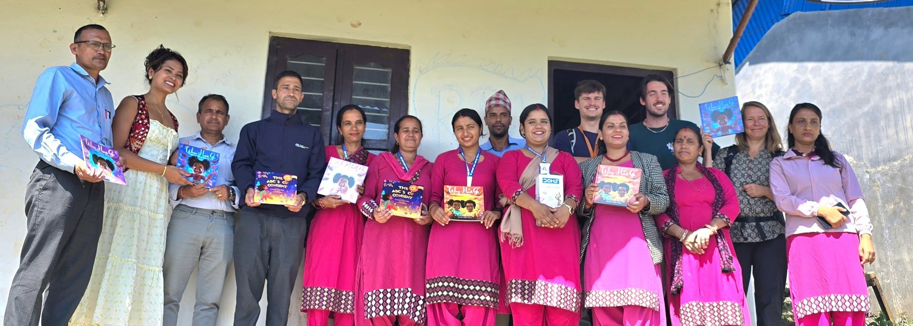 Good Touch, Bad Touch program with teachers holding children's books on consent